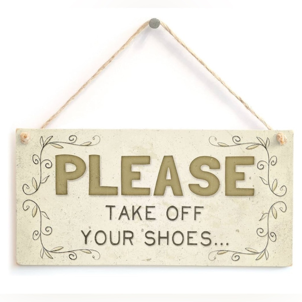 Wall sign “Please Take Off Your Shoes”